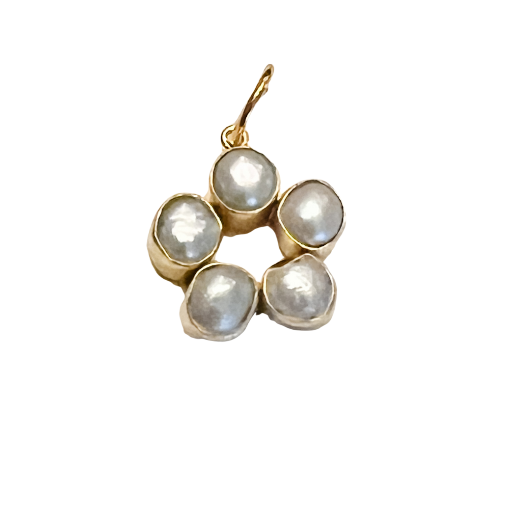 Gold-tone charm featuring a cluster of five pearl-style stones arranged in a floral shape on a white background.