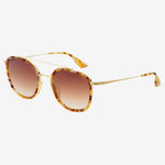 Sunglasses with tortoiseshell frame and brown gradient lenses on a white background