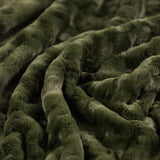 Close-up of a textured green fabric