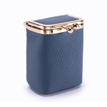 Blue textured jewelry box with gold accents on a white background