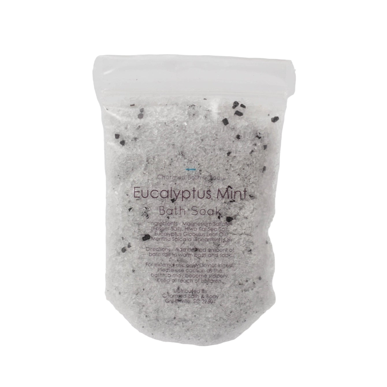 Bath bomb with speckles on a white background