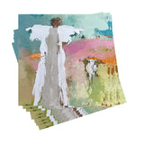 Stack of cocktail napkins with artistic design of an angel on a white background