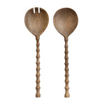 Two wooden salad servers with long handles on a white background