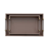 A rectangular tray with a warm taupe-brown finish and two clear acrylic handles with brass-colored end caps, shown against a plain white background.