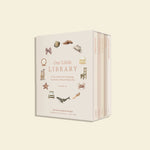 Box set titled 'Our Little Library' with illustrations on a beige background