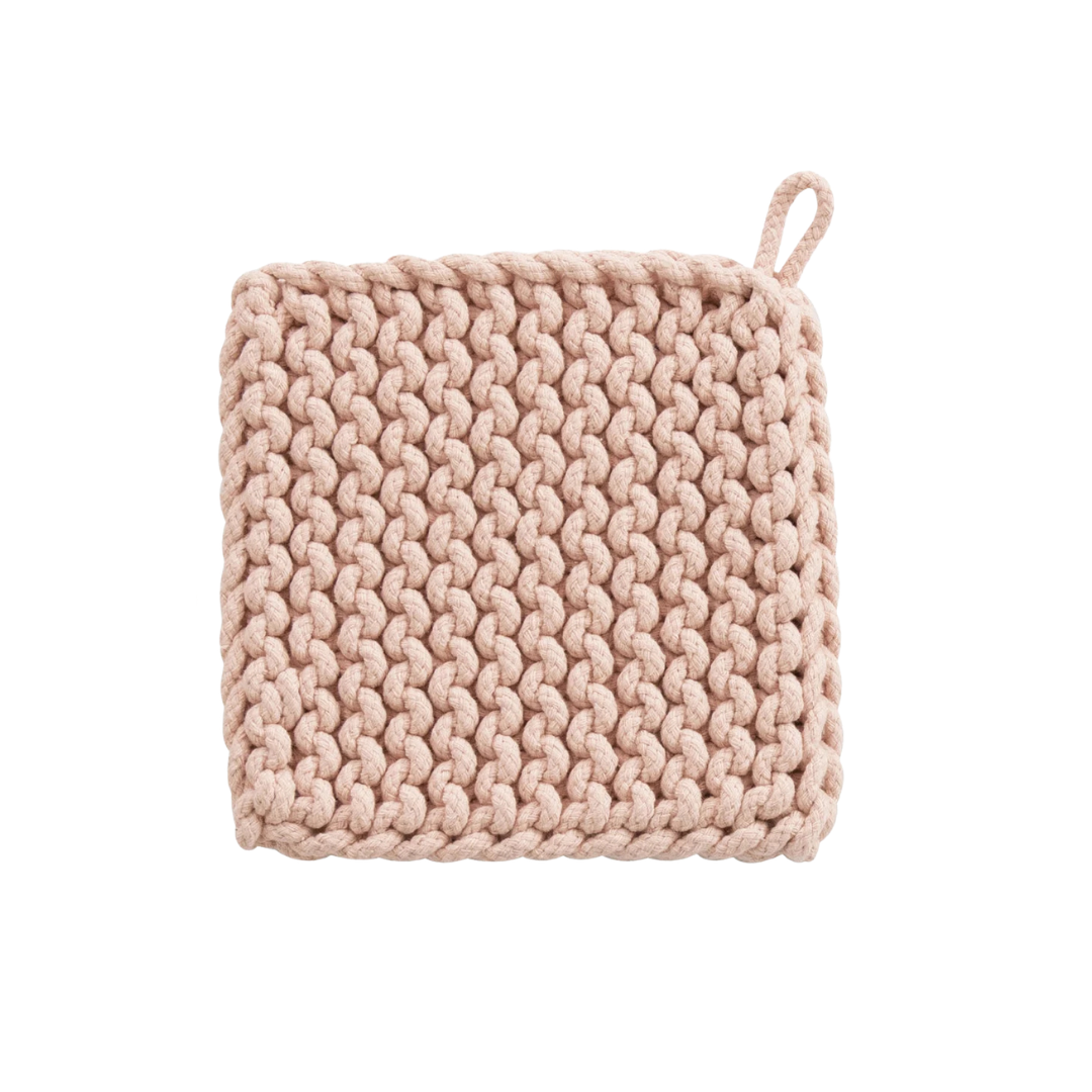 Knitted pink potholder with a handle on a white background