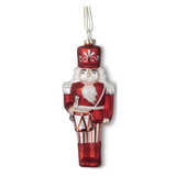 red & white blown glass nutcracker/soldier ornament, style a holding a drum