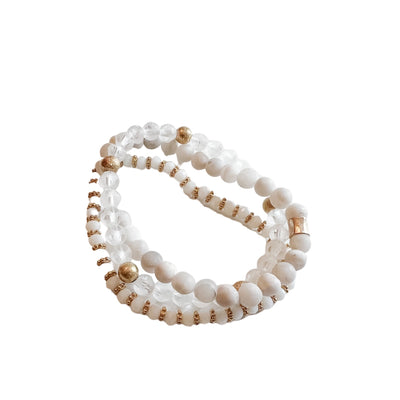 braceletCrafted with white and clear stone beads and gold accents