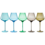 Five colorful wine glasses of different shapes on a white background