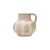 Decorative ceramic pitcher with a rounded body, integrated handle, and layered beige finish with subtle vertical glazing on white background