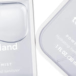 Close-up of a hand sanitizer container with text on a white background