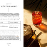 Cocktail recipe for Negroni Sbagliato with a glass of cocktail on a table.