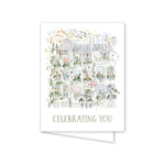 Greeting card with a colorful illustration of a building facade and 'Celebrating You' text on a white background