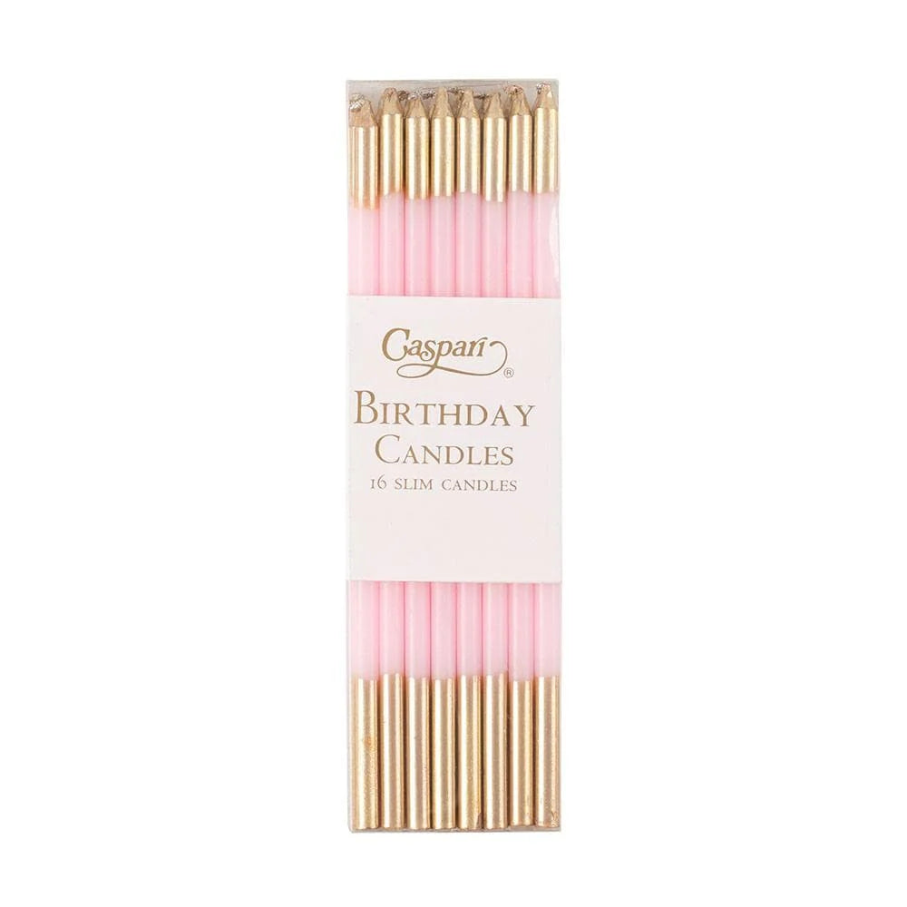 Pack of pink and gold birthday candles with Caspari branding on a white background