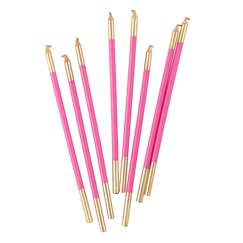 Set of pink and gold pens on a white background