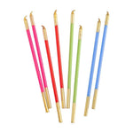Set of colorful candles with gold tips on a white background