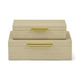 Set of two beige vanity boxes with gold handles on a white background