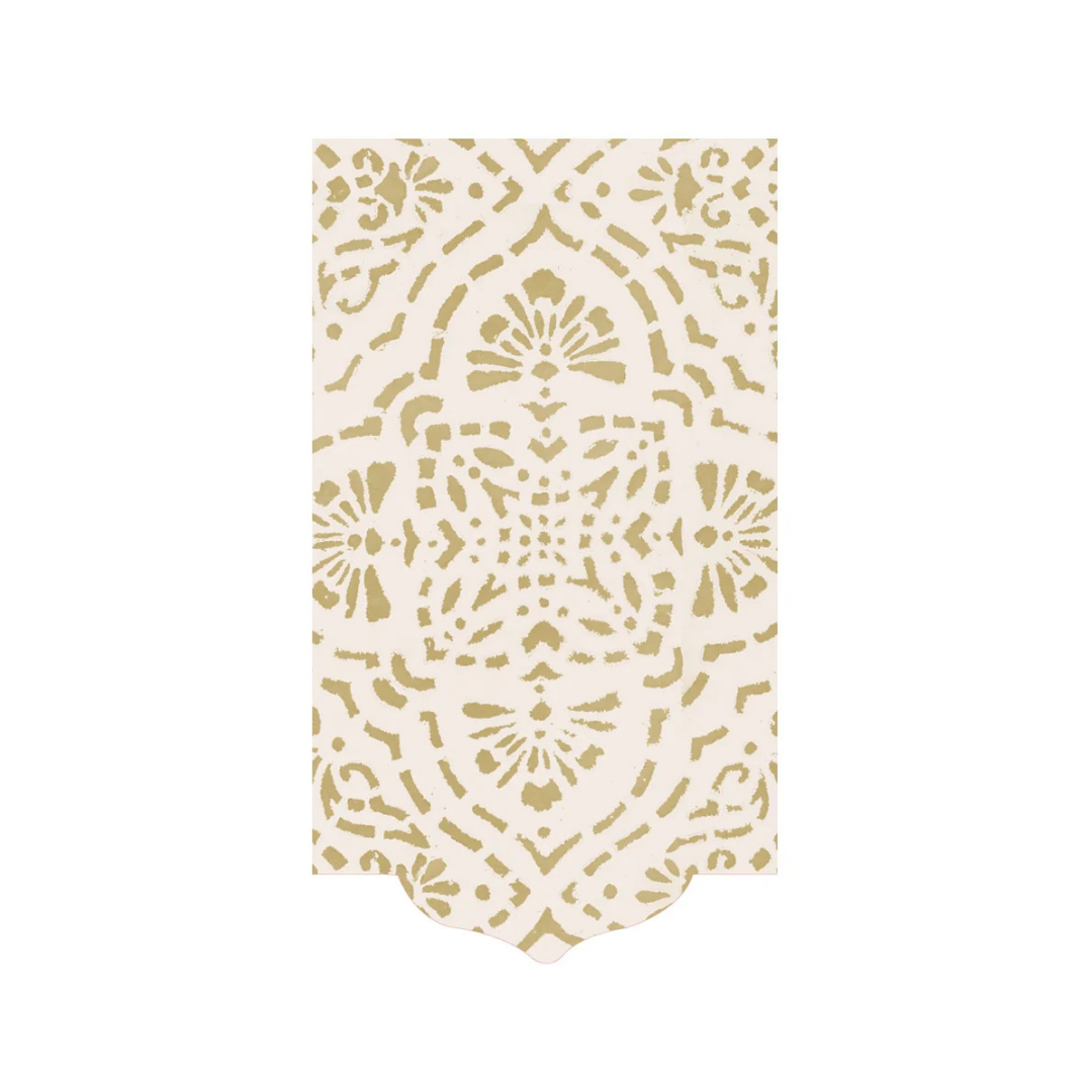 A rectangular cream-colored paper napkin with a scalloped bottom edge, featuring a gold stenciled mandala and floral pattern, shown on a plain white background.