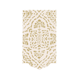 A rectangular cream-colored paper napkin with a scalloped bottom edge, featuring a gold stenciled mandala and floral pattern, shown on a plain white background.