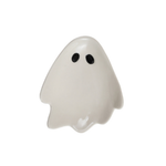 A small white ghost-shaped spoon rest with two black eyes, shown on a plain white background.