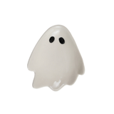 A small white ghost-shaped spoon rest with two black eyes, shown on a plain white background.