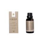 Lavant Collective Amber Scent laundry fragrance oil shown with its beige box packaging and a dark amber glass bottle with a black cap on a white background.