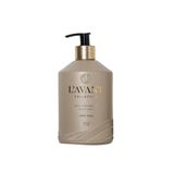 A bottle of L'avant Collective hand soap in the Amber Scent variant, featuring a matte taupe-beige bottle with a black pump and gold collar, set against a plain white background.