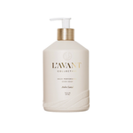 L'Avant Collective Andrea Santeal high performing dish soap in a matte cream-colored pump bottle with a metallic gold collar and white pump dispenser, set against a plain white background.