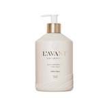 L'Avant Collective Andrea Santeal high performing dish soap in a matte cream-colored pump bottle with a metallic gold collar and white pump dispenser, set against a plain white background.
