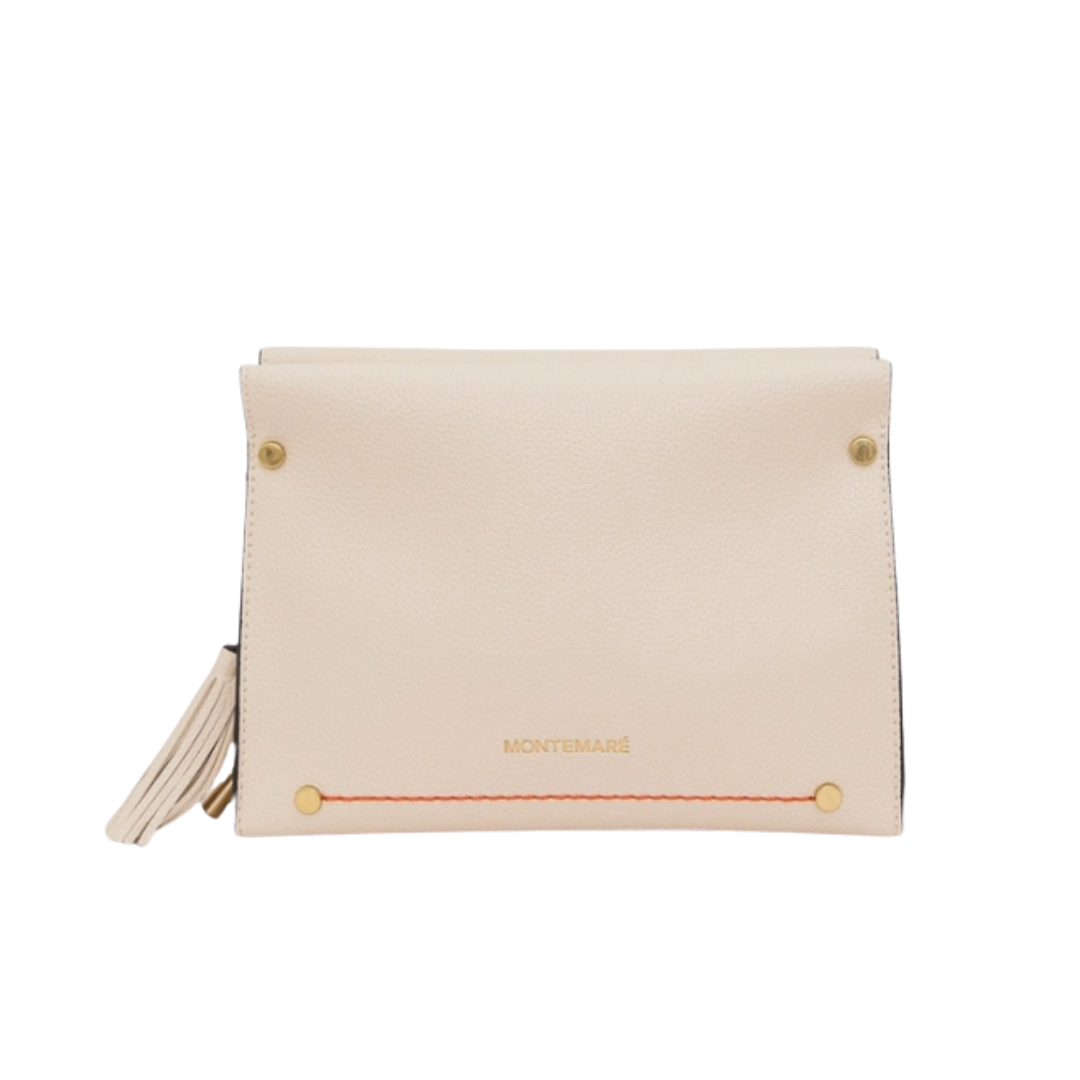 A Montemare cream-colored Vienna Crossbody leather wallet with gold-tone hardware, a decorative tassel, and a thin red stitched line across the front, shown against a plain white background.
