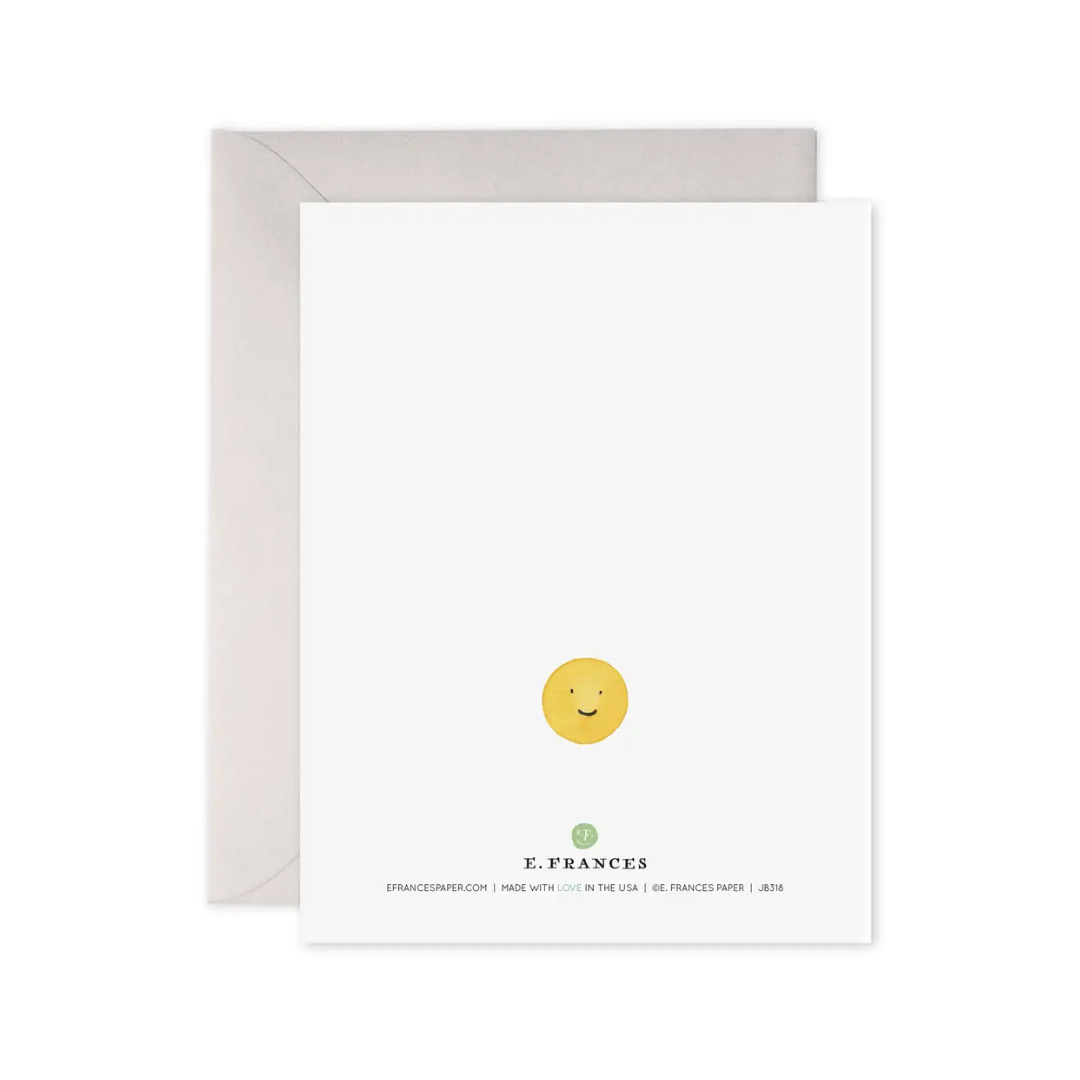 Greeting card with smiley face design and E. Frances branding on a white background