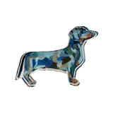 Colorful dachshund-shaped acrylic shelf sitter on a white background