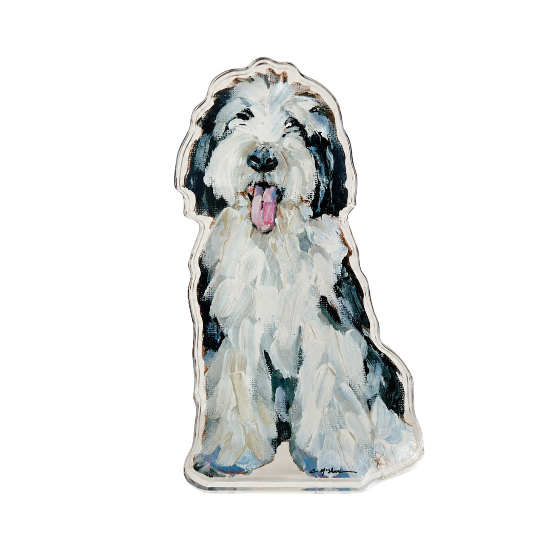 sheepadoodle dog shelfie featuring painted artwork encased in a thick clear freestanding block on white background