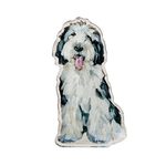 sheepadoodle dog shelfie featuring painted artwork encased in a thick clear freestanding block on white background