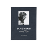 Book cover of 'Jane Birkin: Icon of Style' by Sophie Gachet with a black and white portrait of Jane Birkin on a dark blue background.