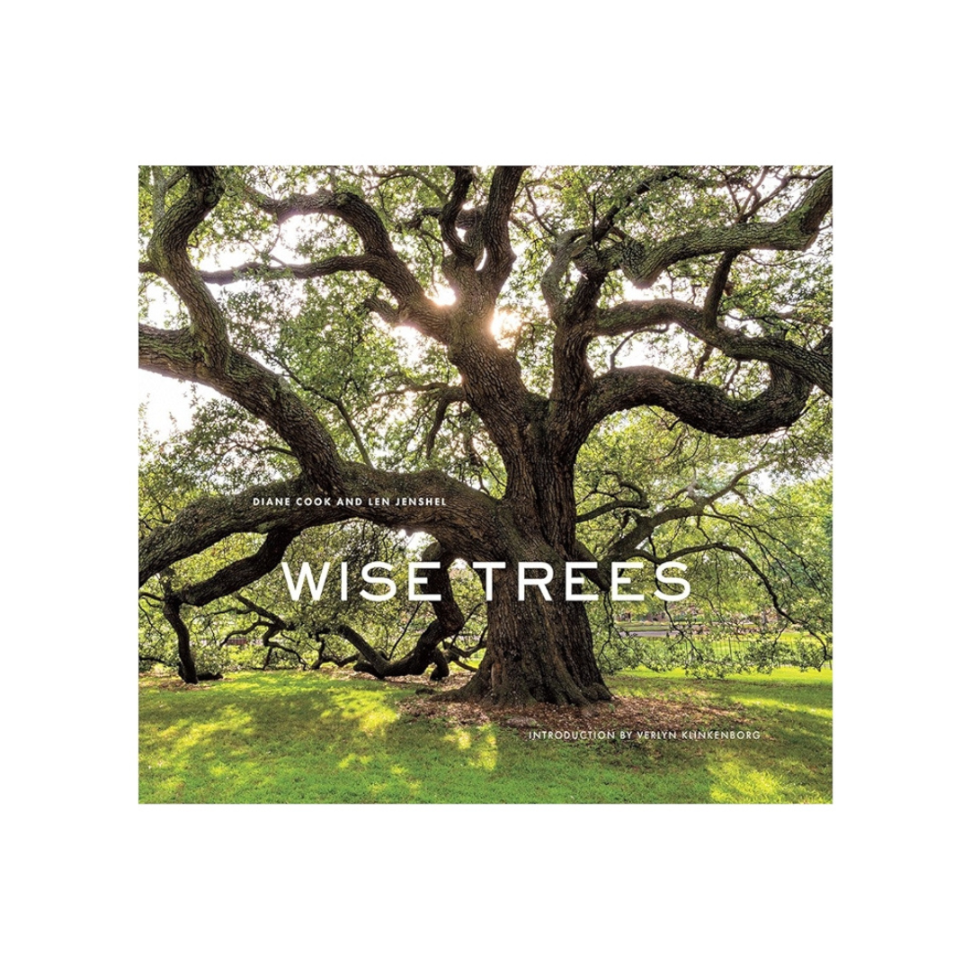 Book cover of 'Wise Trees' with a large tree and greenery on a white background