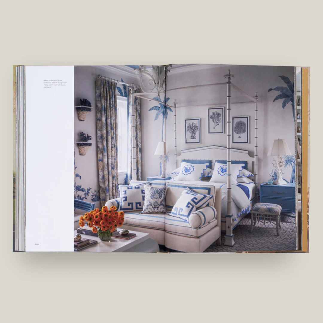 Open book showing a decorated bedroom with furniture and decor.