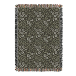 Floral patterned throw blanket with fringe on a white background