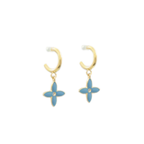 Gold hoop earrings with blue flower-shaped charms on a white background