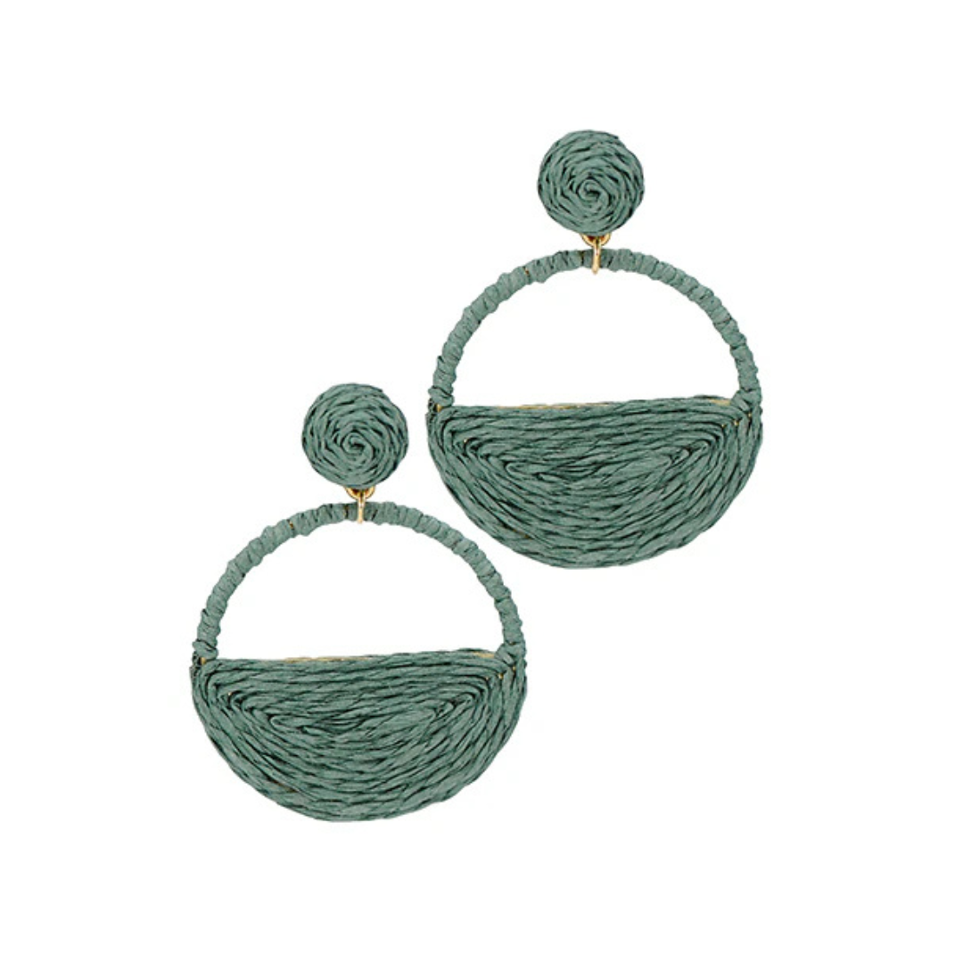 Pair of teal woven earrings on a white background