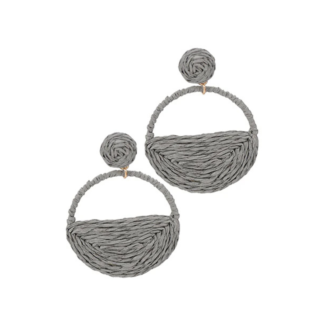 Pair of gray earrings on a white background