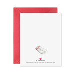 back of birthday greeting card showing a pair of socks with coordinating envelope