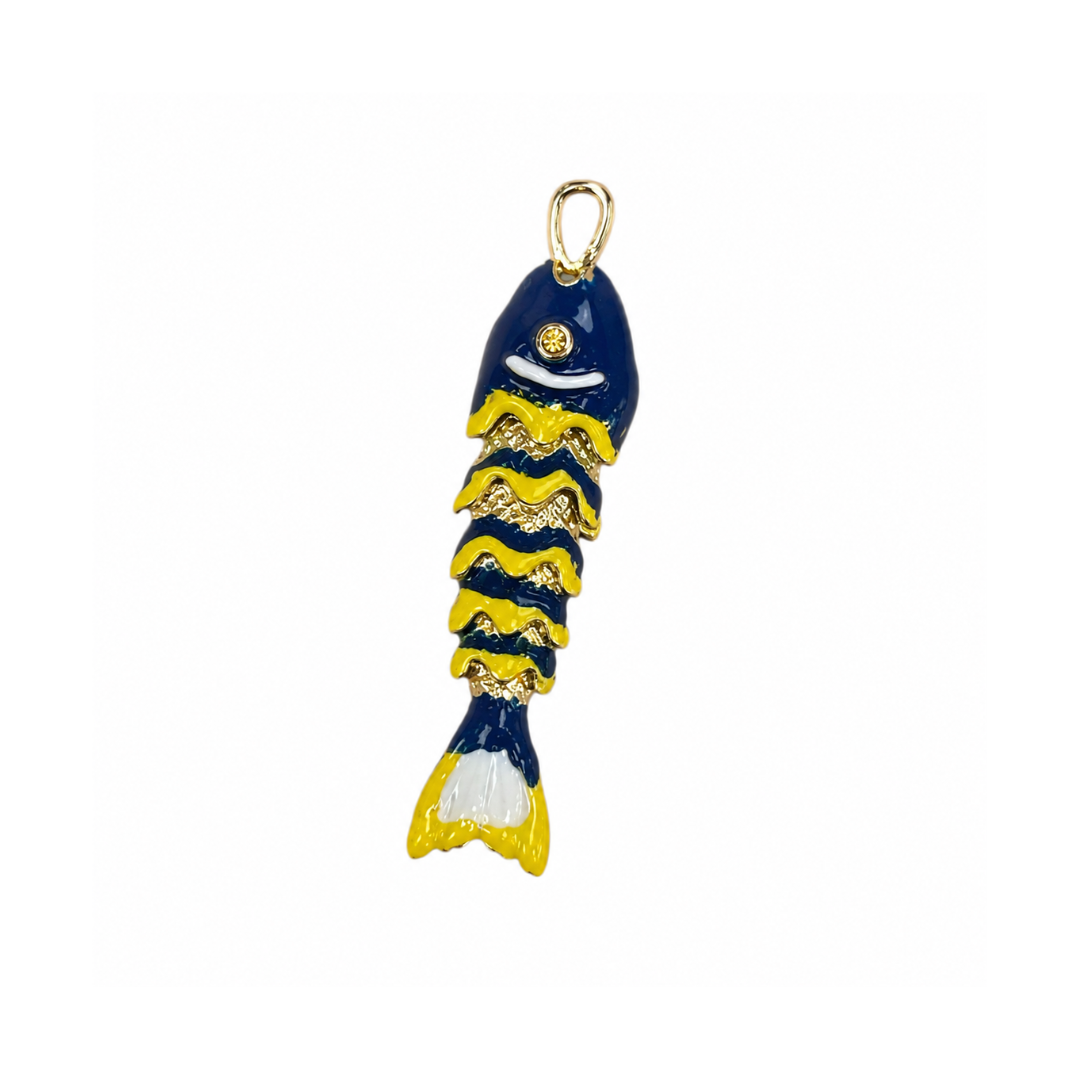 A small fish-shaped charm or pendant with a gold-tone loop at the top, featuring a dark blue body with yellow wavy stripes and white accents, shown on a plain white background.