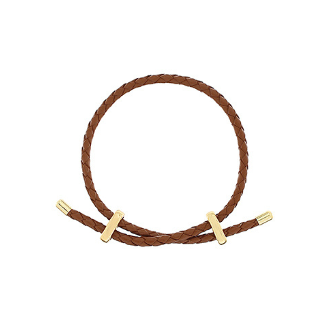 A brown braided cord bracelet with two gold-toned metal slide rings, displayed on a clean white background.