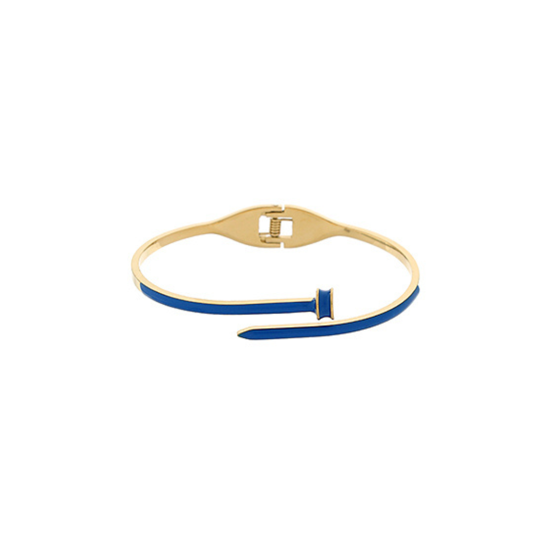 A gold-plated bangle bracelet with a vibrant blue enamel inlay, shown on a plain white background.