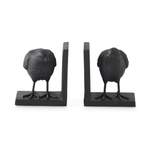 A pair of black metal bird bookends shaped like small birds standing on rectangular bases, shown on a plain white background.