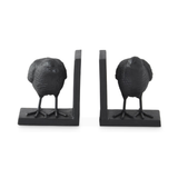 A pair of black metal bird bookends shaped like small birds standing on rectangular bases, shown on a plain white background.