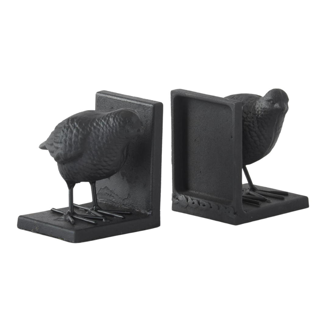 A pair of black cast-iron bird bookends shaped like small birds perched on a rectangular base, shown on a plain white background.