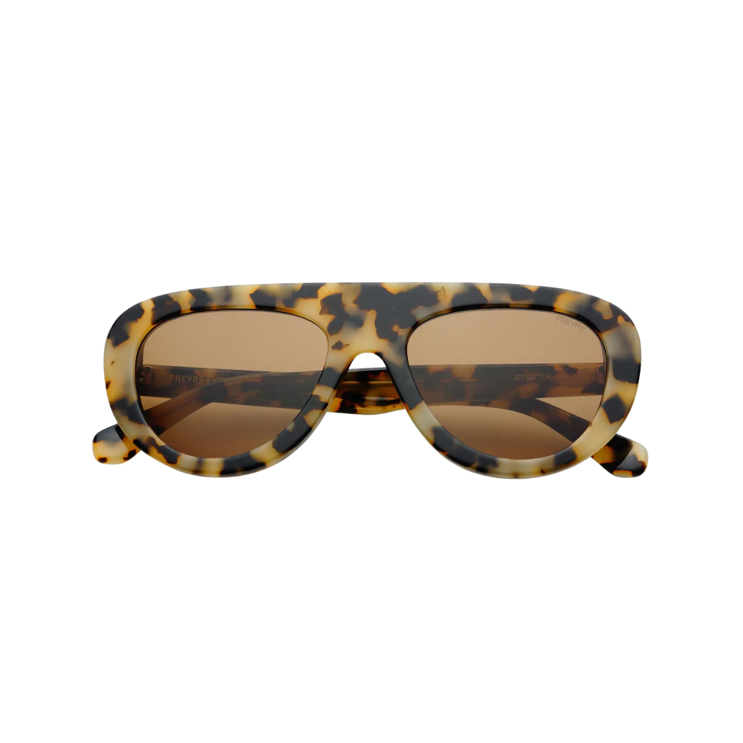 Tortoiseshell Freyrs Jett sunglasses with brown lenses on a white background