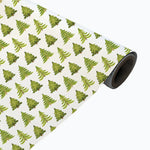 Roll of paper with green tree pattern on a white background